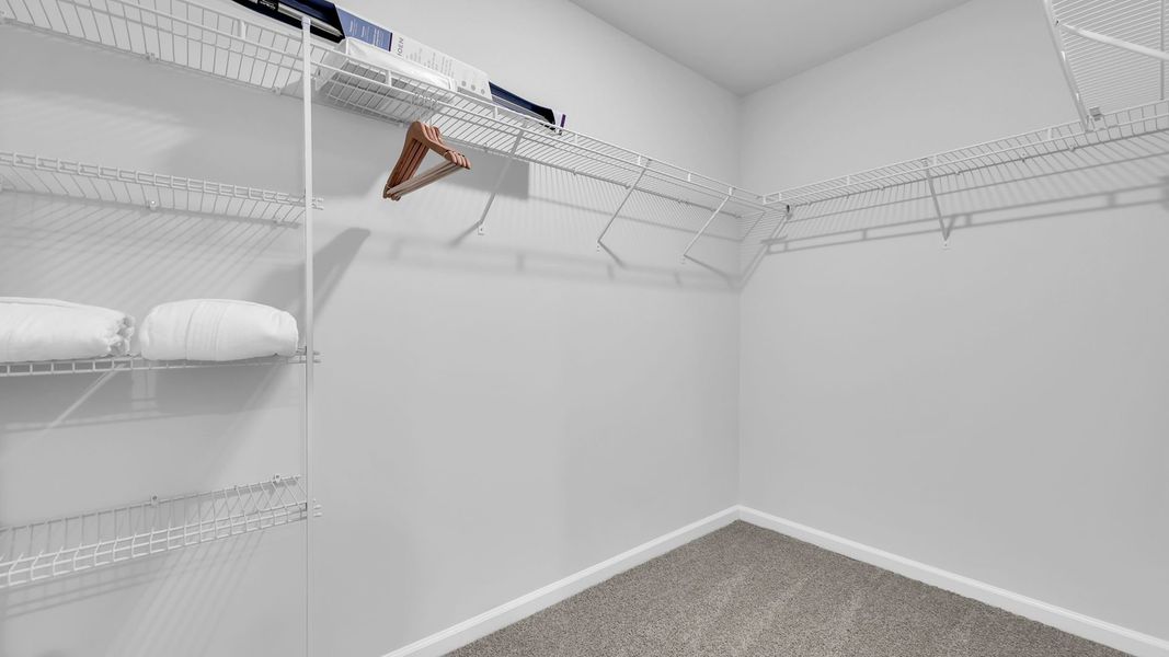 Furnished interior in a model home at The Ranch in Holly Hill (Image 30).