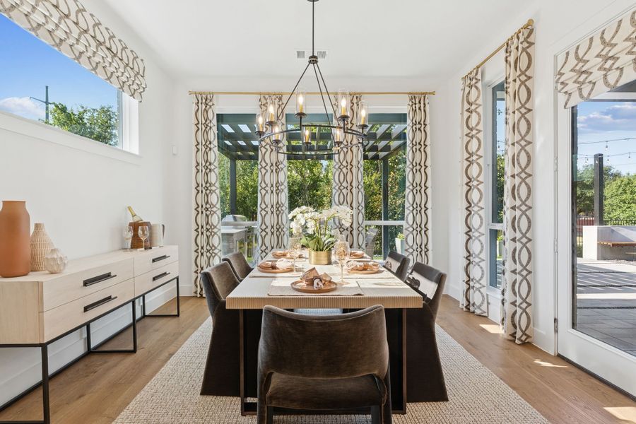 Plan 1640 Dining Area - Bella Casa Model Photo Plan 1640 Dining Area - Bella Casa Model Photo