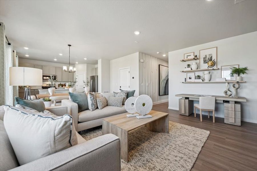 A living room with a wood floor.