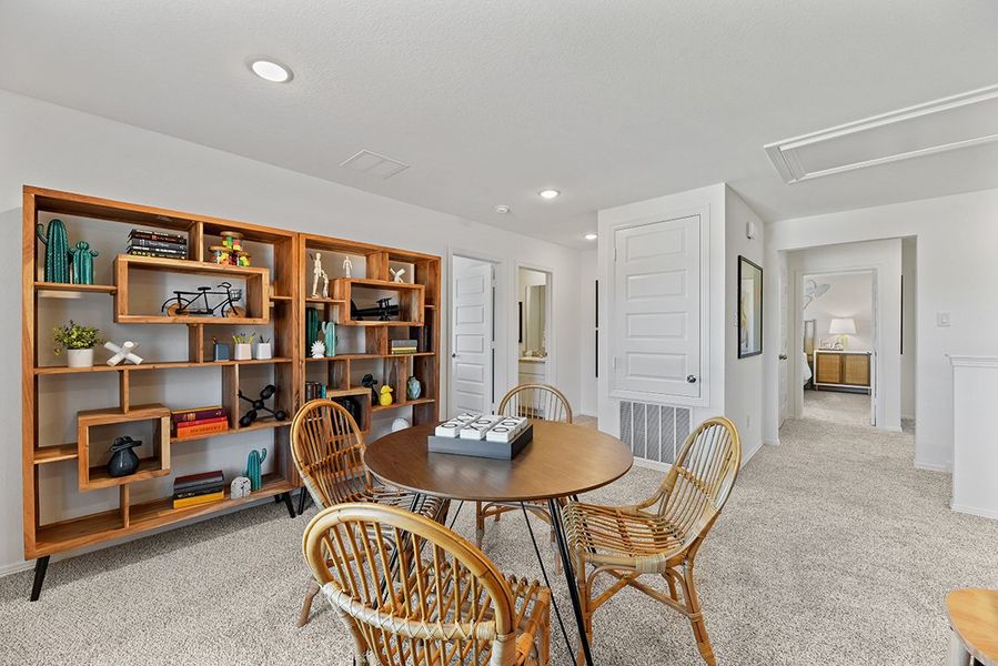 A room with a table and chairs. A room with a table and chairs.