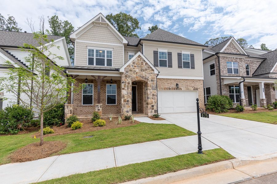 Front exterior of a home in the Waterhaven community, located in Cumming, GA (Image 16).