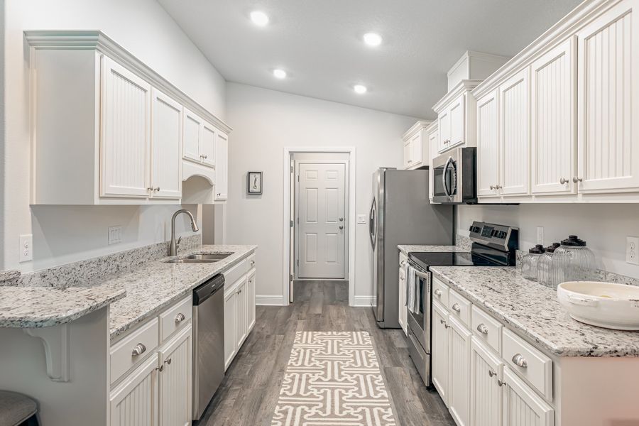 Furnished interior in a model home at Ridgeway Landing in Crestview (Image 6).