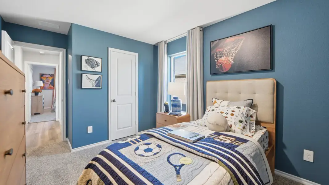 Furnished interior in a model home at Webster Meadows in Ponder (Image 20).