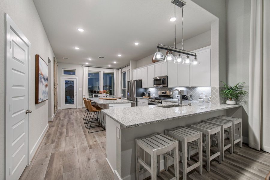 Furnished interior in a model home at Stillwater Ranch in San Antonio (Image 6).