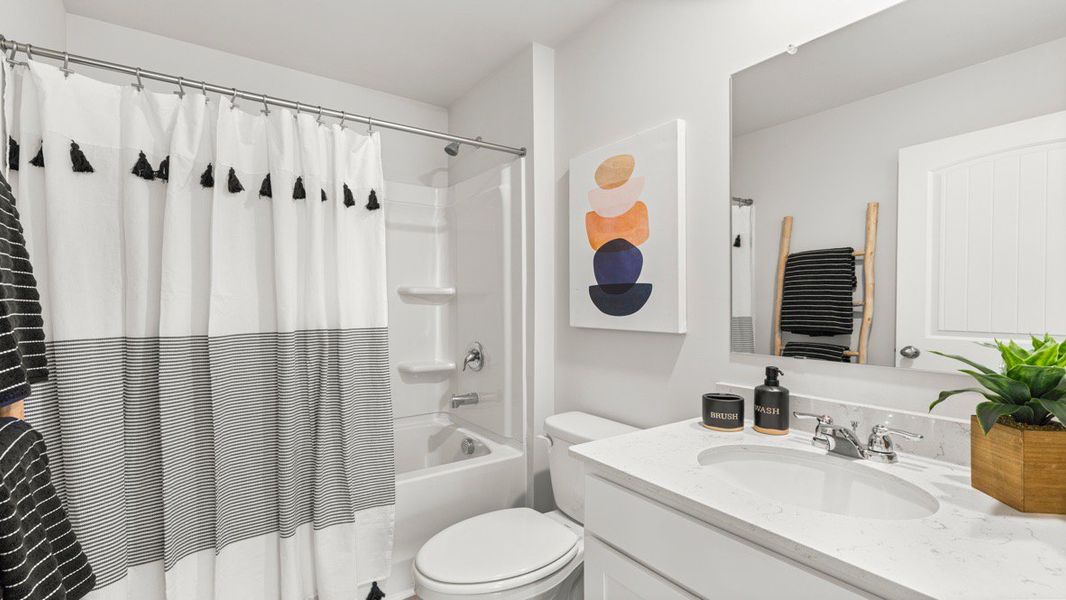 Furnished interior in a model home at Waypoint in Flowery Branch (Image 20).