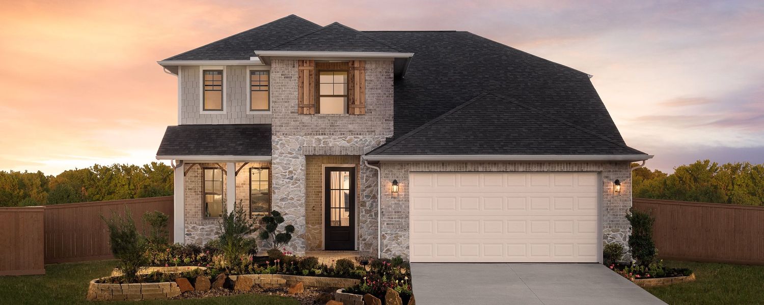 Front exterior of a home in the Sunterra 50ft community, located in Katy, TX (Image 1).