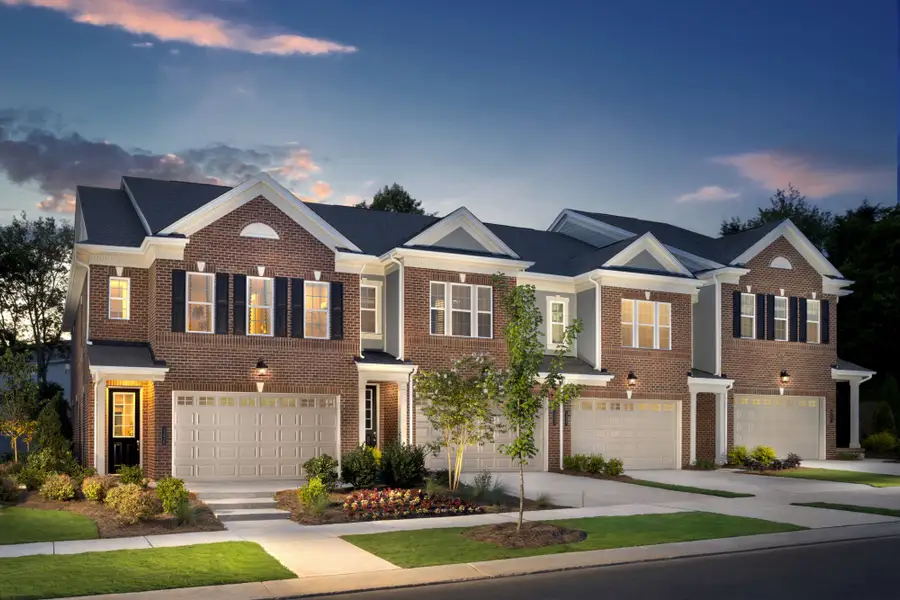 Front exterior of a home in the The Townes at Wade Ardrey community, located in Charlotte, NC (Image 1).