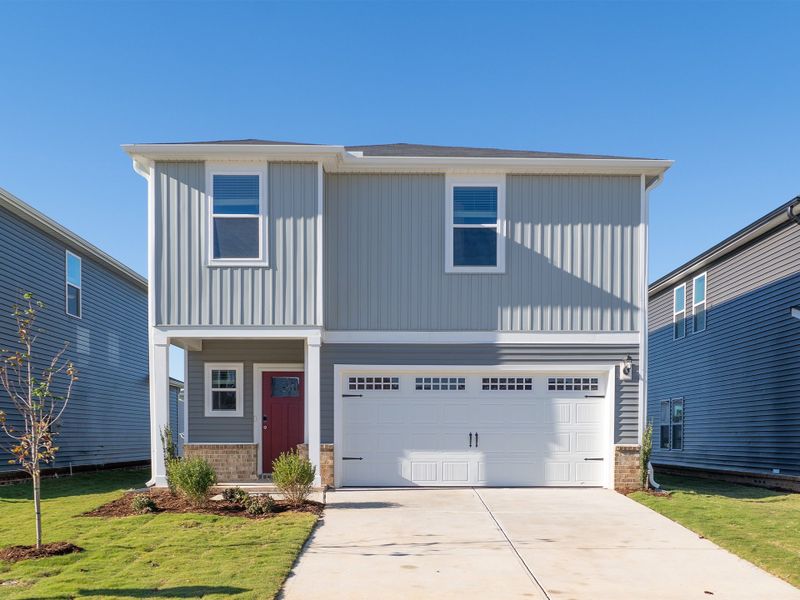 Front exterior of a home in the Oak Manor - Classic Series community, located in Garner, NC (Image 1).