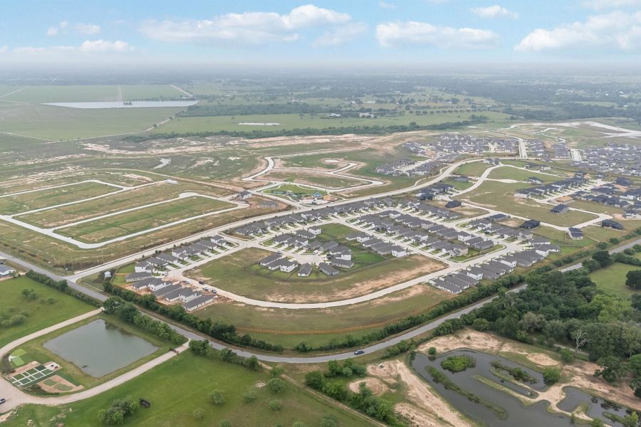 Aerial view of the Bluestem community in Brookshire, TX, showing layout and nearby surroundings (Image 12). Aerial view of the Bluestem community in Brookshire, TX, showing layout and nearby surroundings (Image 12).