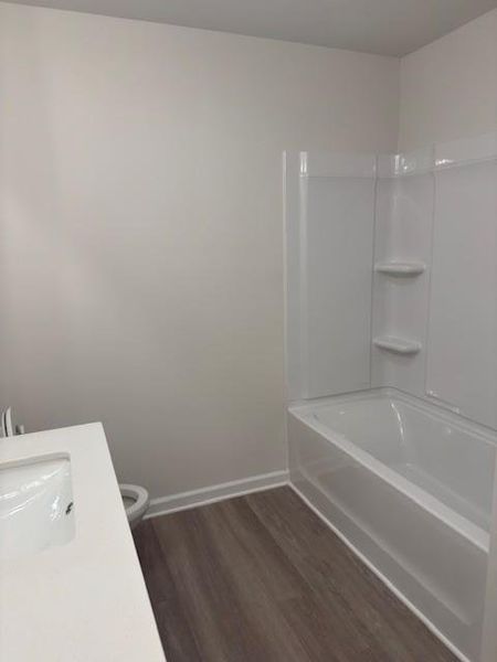 Furnished interior view inside a new home in Medlock Park, Austell (Image 4).