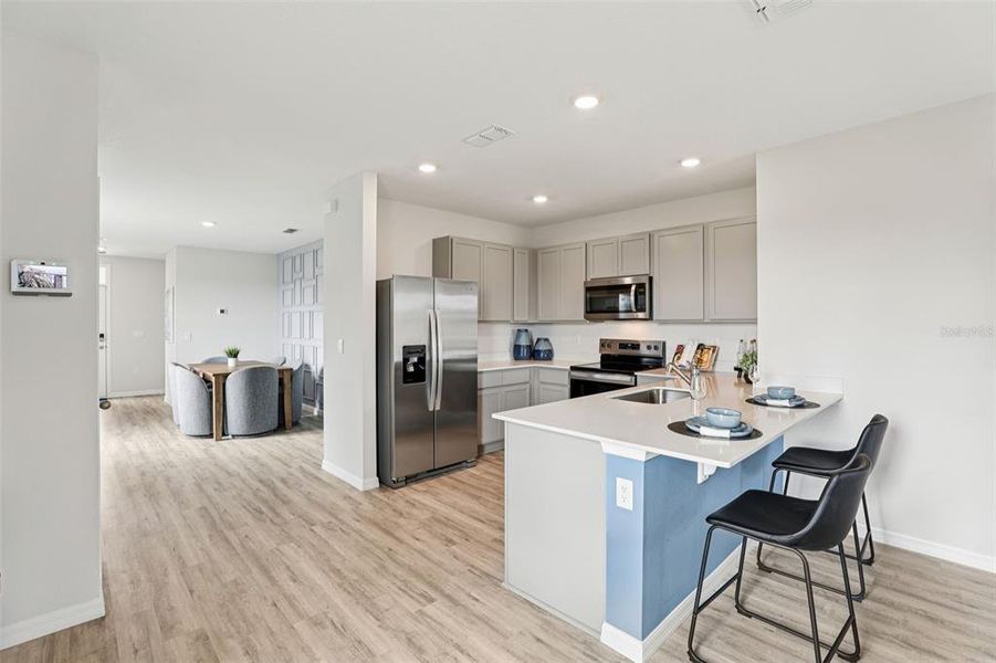 Furnished interior view inside a new home in , Winter Haven (Image 9). Furnished interior view inside a new home in , Winter Haven (Image 9).
