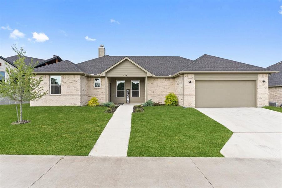 Front exterior of a new home in , Rockwall, TX, highlighting curb appeal (Image 1). Front exterior of a new home in , Rockwall, TX, highlighting curb appeal (Image 1).