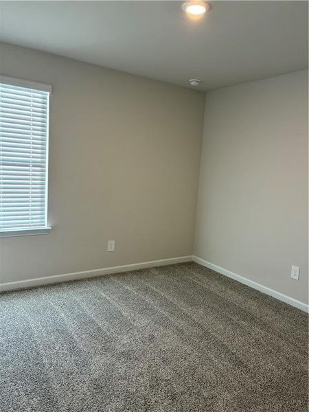 Spacious, unfurnished interior of a new home in Hamilton Crossing, Buford (Image 16).