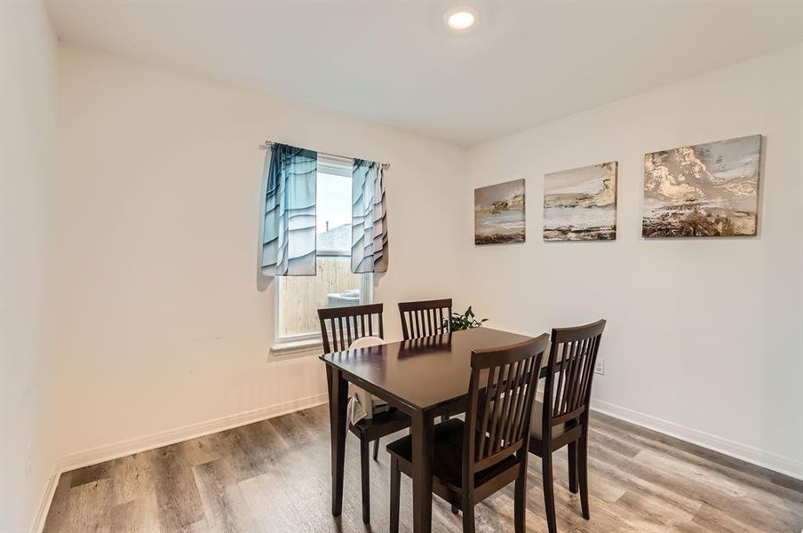 Dining room featuring hardwood / wood-style flooring