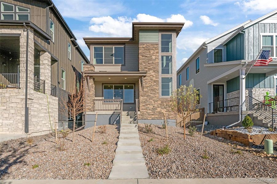 Exterior details and patio area of a home in Painted Prairie, Aurora (Image 28). Exterior details and patio area of a home in Painted Prairie, Aurora (Image 28).
