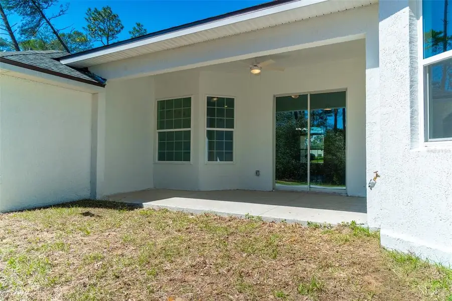 Exterior details and patio area of a home in , Ocala (Image 3).