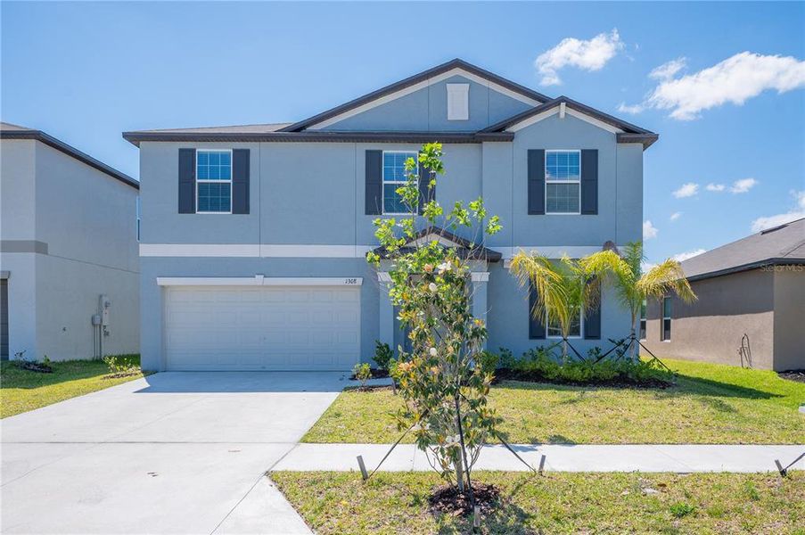 Front exterior of a new home in , Plant City, FL, highlighting curb appeal (Image 23).