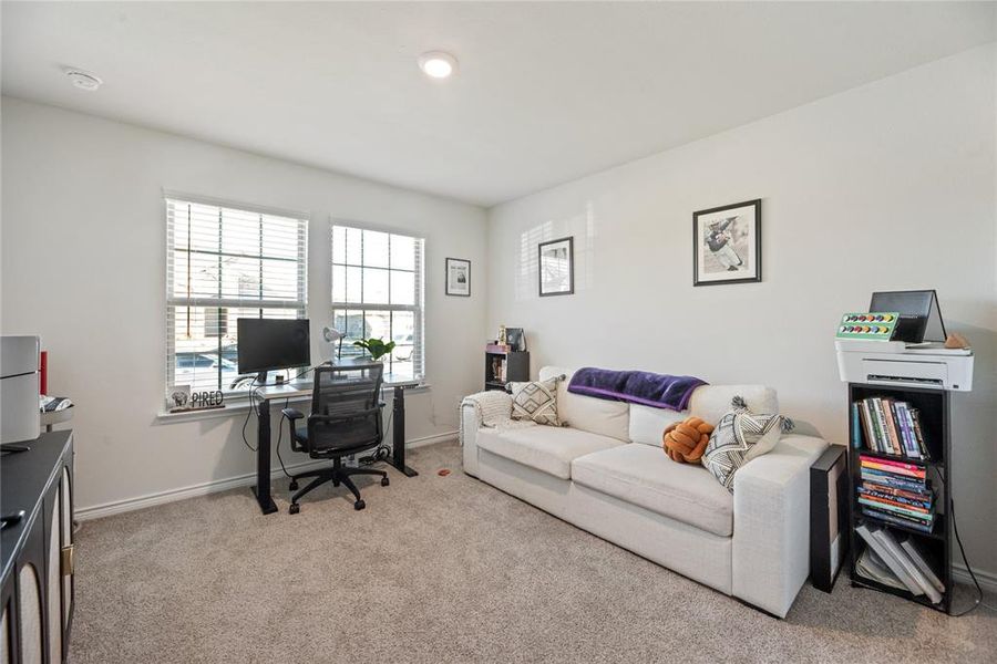 Office area with carpet and baseboards