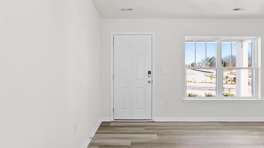 Spacious, unfurnished interior of a new home in Village Grove, Greenville (Image 16).
