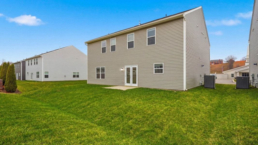 Exterior details and patio area of a home in Polo Fields, Kingsport (Image 2).