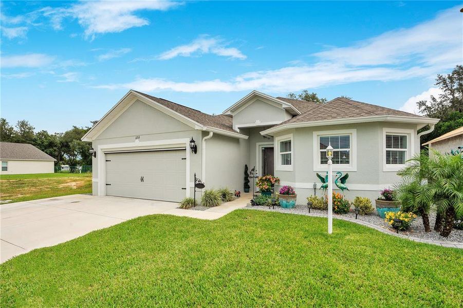 Front exterior of a new home in , Avon Park, FL, highlighting curb appeal (Image 2). Front exterior of a new home in , Avon Park, FL, highlighting curb appeal (Image 2).
