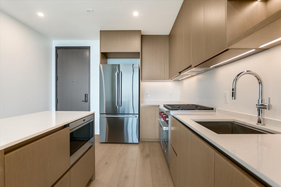 Photos shown are of the same floor plan three floors higher.