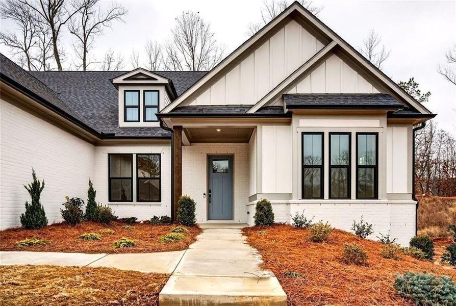 Front exterior of a new home in , Cumming, GA, highlighting curb appeal (Image 26).