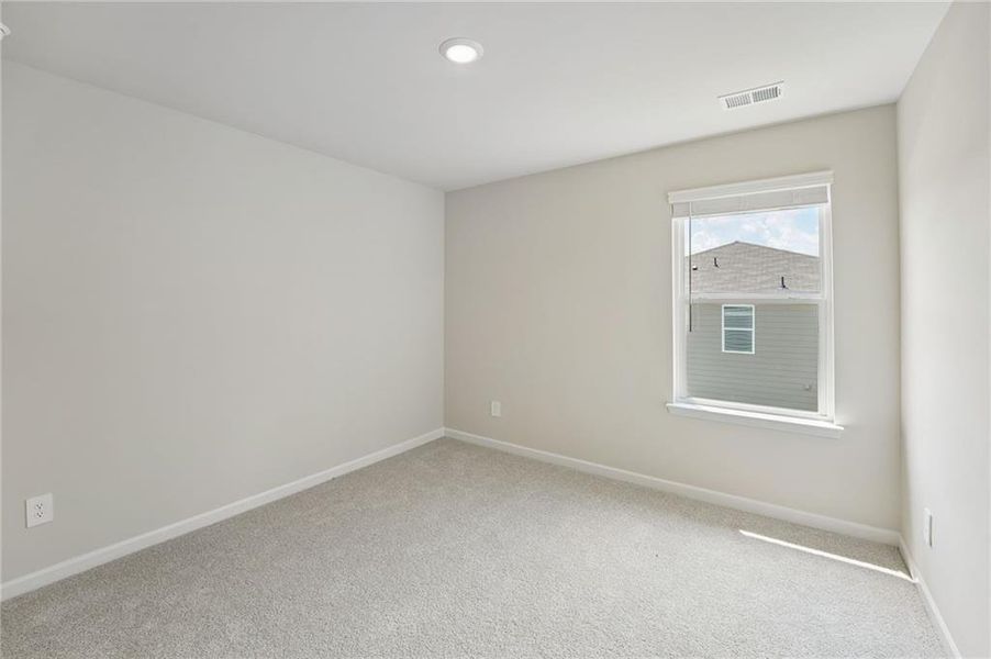 Spacious, unfurnished interior of a new home in Northwoods at Mirror Lake, Villa Rica (Image 33).