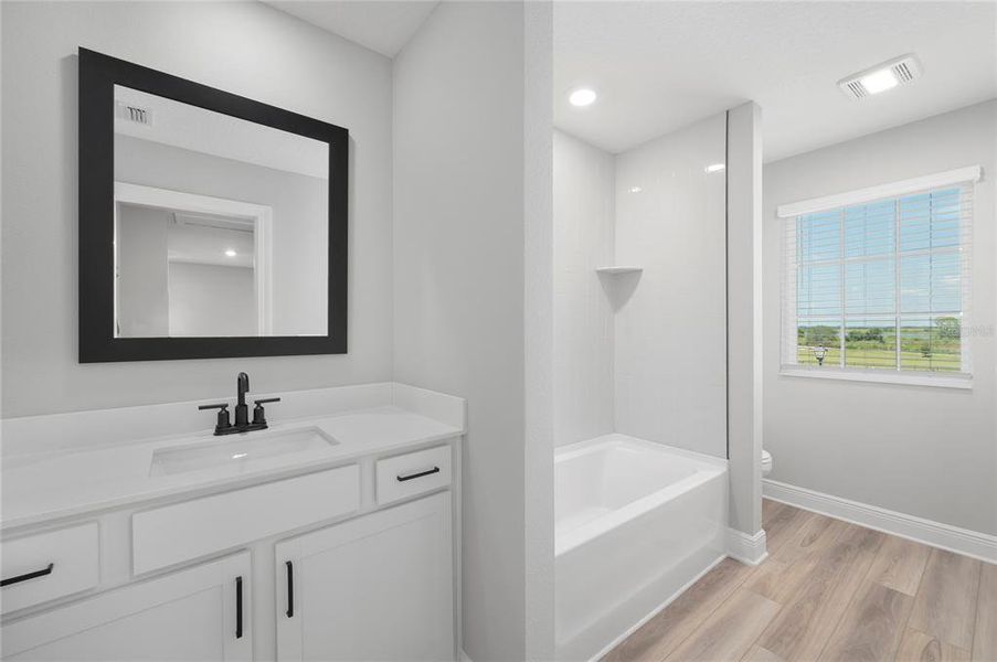 Furnished interior view inside a new home in Gum Lake Preserve, Lake Alfred (Image 10).