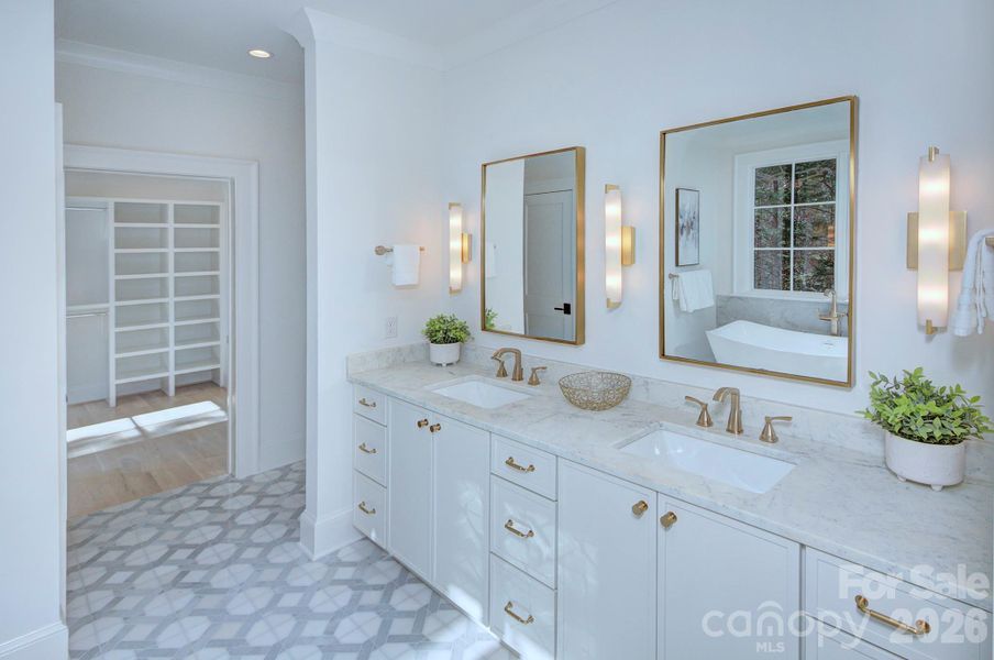 Primary bathroom with view of closet