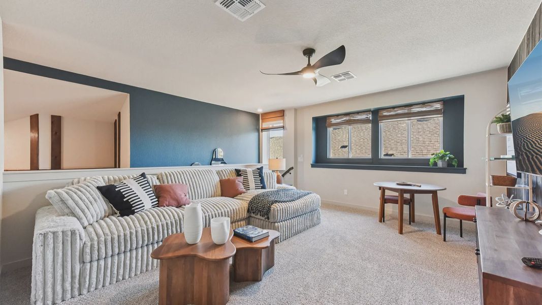 Representative furnished interior of a home built from the Peyton by Chesmar Homes in The Grove at Blackhawk, Pflugerville (Image 40).