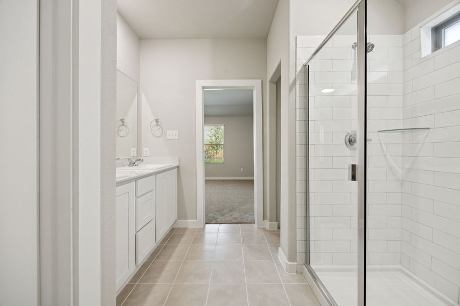 Primary Bathroom in the Oscar home plan by Trophy Signature Homes – REPRESENTATIVE PHOTO Primary Bathroom in the Oscar home plan by Trophy Signature Homes – REPRESENTATIVE PHOTO