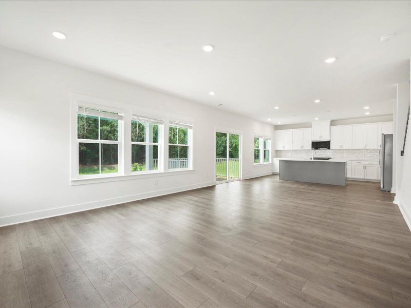 Spacious, unfurnished interior of a new home in The Coves at Lakes of Cane Bay, Summerville (Image 8). Spacious, unfurnished interior of a new home in The Coves at Lakes of Cane Bay, Summerville (Image 8).