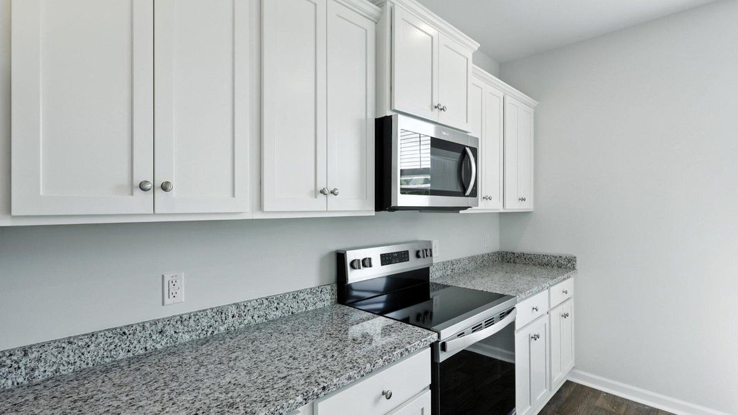 Furnished interior view inside a new home in The Ranch, Holly Hill (Image 14).