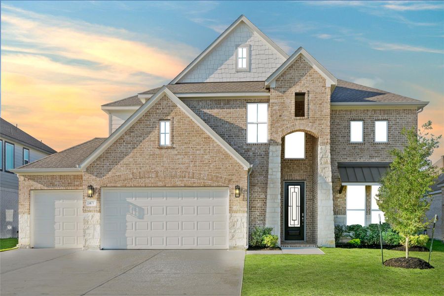 Front exterior of a new home in Beacon Hill, Waller, TX, highlighting curb appeal (Image 14). Front exterior of a new home in Beacon Hill, Waller, TX, highlighting curb appeal (Image 14).
