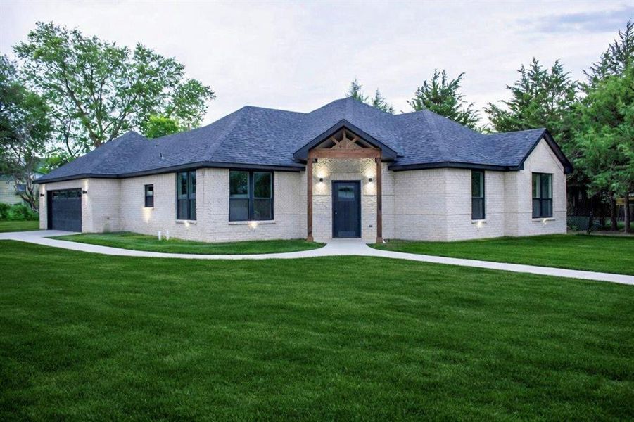Front exterior of a new home in , Glenn Heights, TX, highlighting curb appeal (Image 20).
