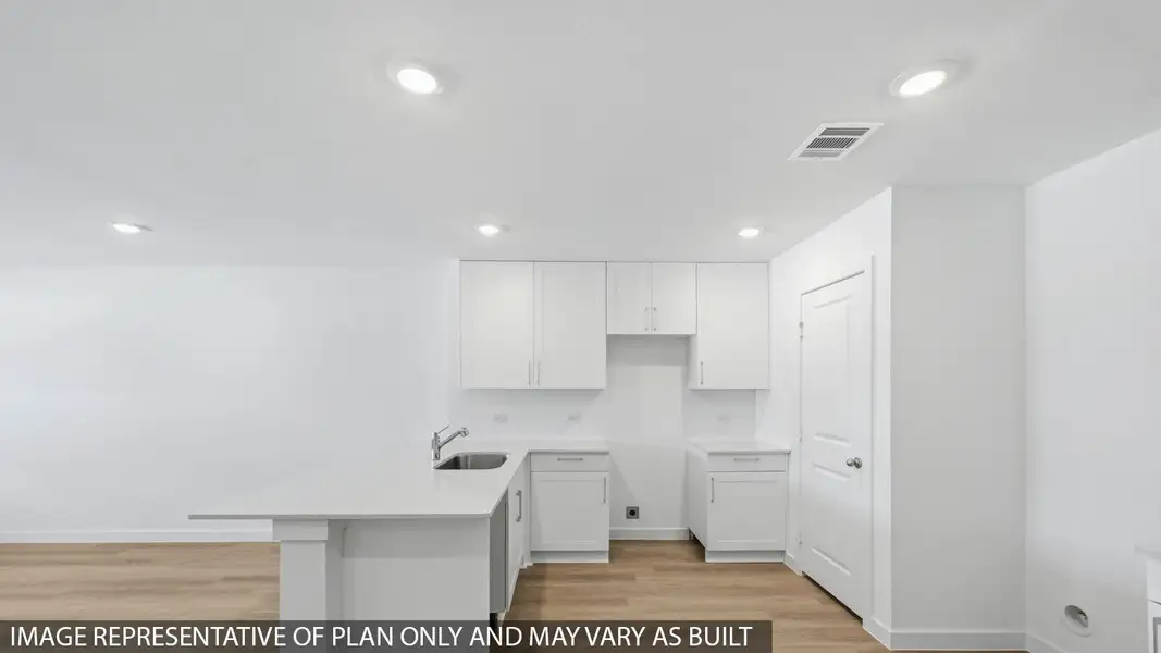 Furnished interior view inside a new home in Baron Village, Conroe (Image 3).