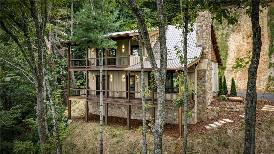 Exterior details and patio area of a home in , Ellijay (Image 28).