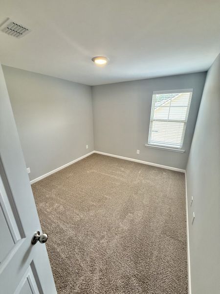 Spacious, unfurnished interior of a new home in Stone Fort Meadows, Manchester (Image 9).