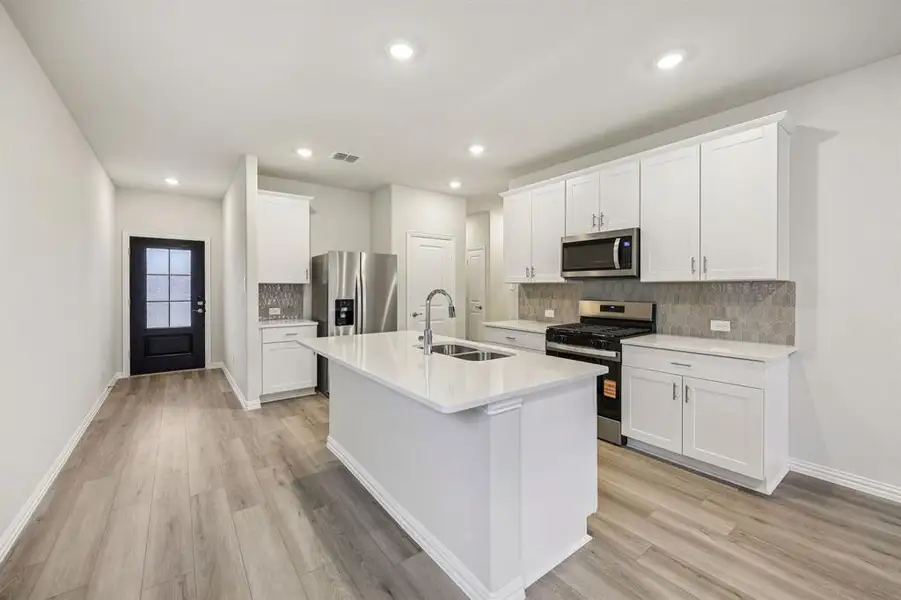 Furnished interior view inside a new home in Parks at Foster Crossing - Spring Series, Anna (Image 8).