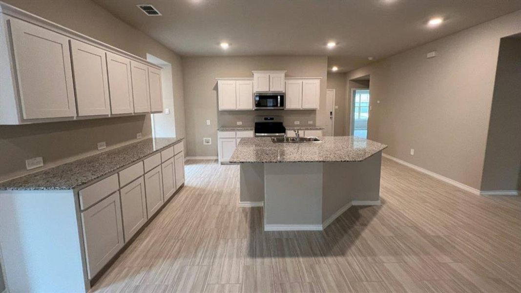 Furnished interior view inside a new home in Rosewood at Beltmill, Fort Worth (Image 4).