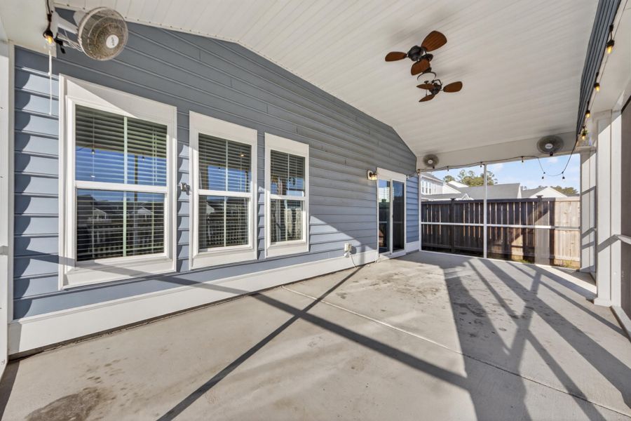 Exterior details and patio area of a home in Azalea Ridge at Summers Corner: Arbor Collection, Summerville (Image 23).