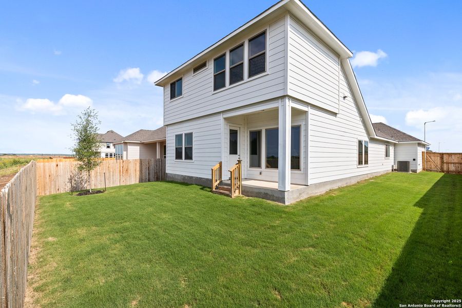 Exterior details and patio area of a home in Megan's Landing, Castroville (Image 3).
