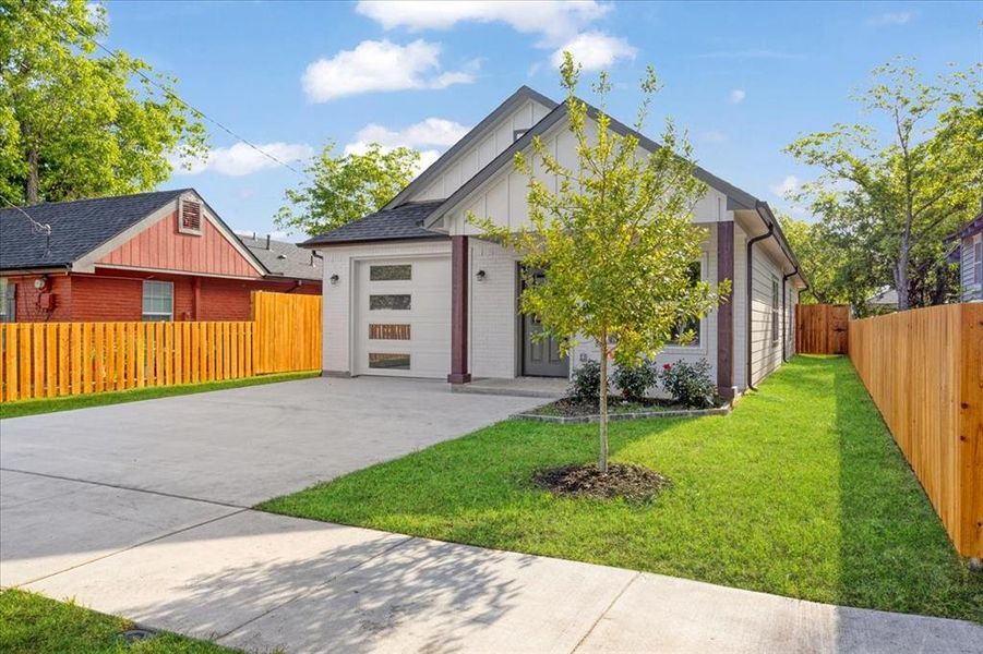 Front exterior of a new home in , Sherman, TX, highlighting curb appeal (Image 16).