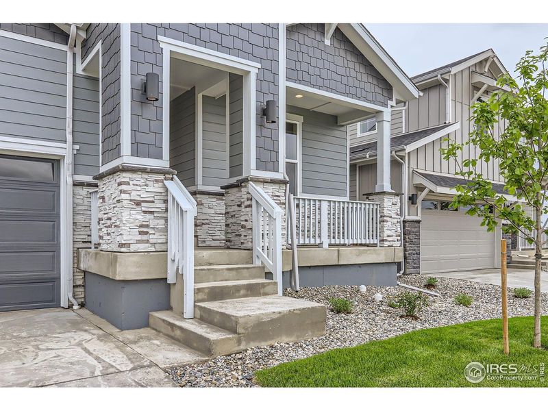 Exterior details and patio area of a home in Barefoot Lakes, Longmont (Image 19).