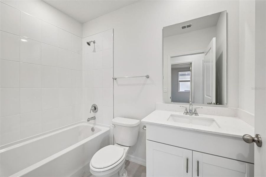 Furnished interior view inside a new home in Ridgehaven - Villas, Ormond Beach (Image 5).