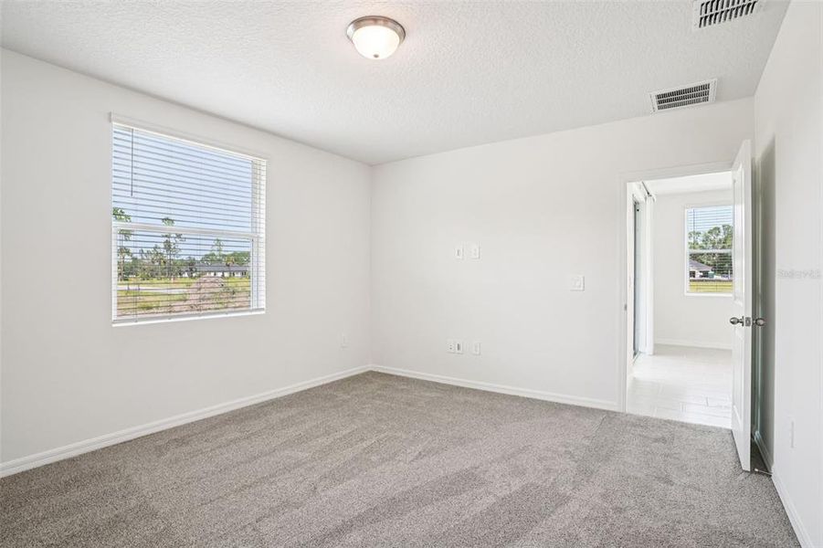 Spacious, unfurnished interior of a new home in Ridgehaven - Villas, Ormond Beach (Image 16).