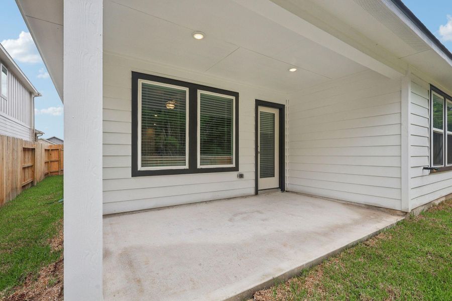 Front exterior of a new home in , New Caney, TX, highlighting curb appeal (Image 16).