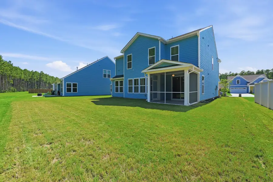 Exterior details and patio area of a home in , Ravenel (Image 27).