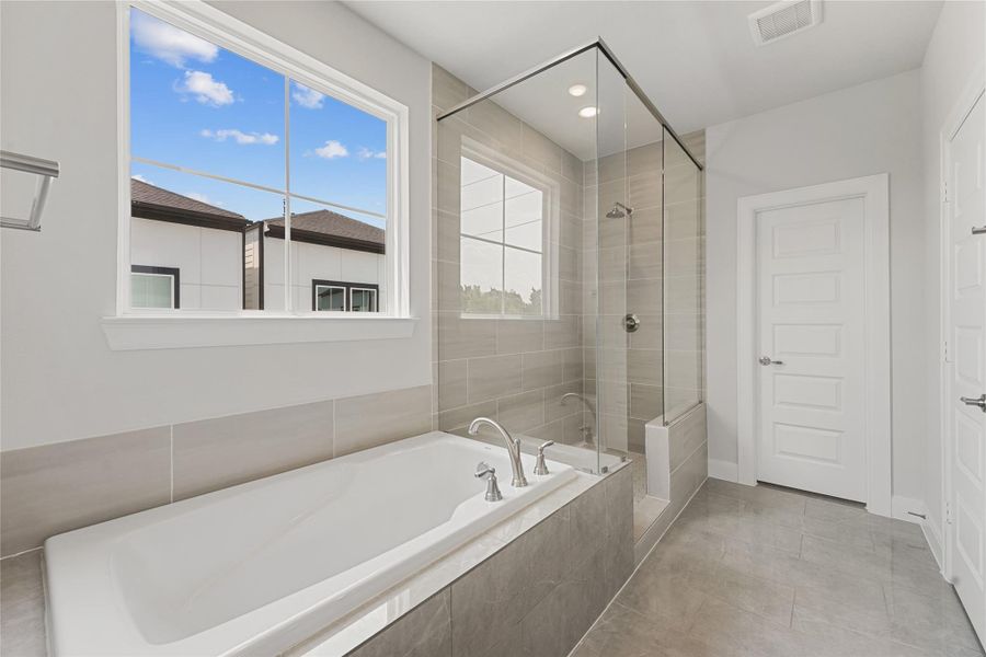 Furnished interior view inside a new home in The Corner At Buffalo Pointe, Houston (Image 26).